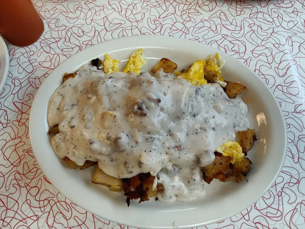 Biscuits Home Fries Fried Eggs Topped with Sausage Gravy